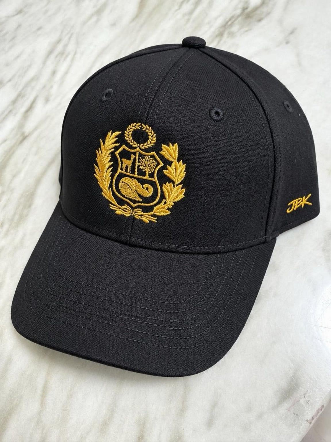 Peru Gold Crest Cap — Black & Gold